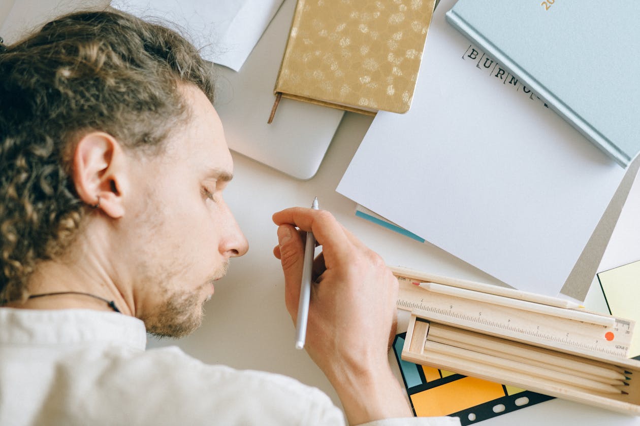 A contractor doing paperwork at night